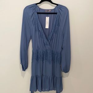Brand new Vici dress with tags! Ties at the waist and is very flattering!